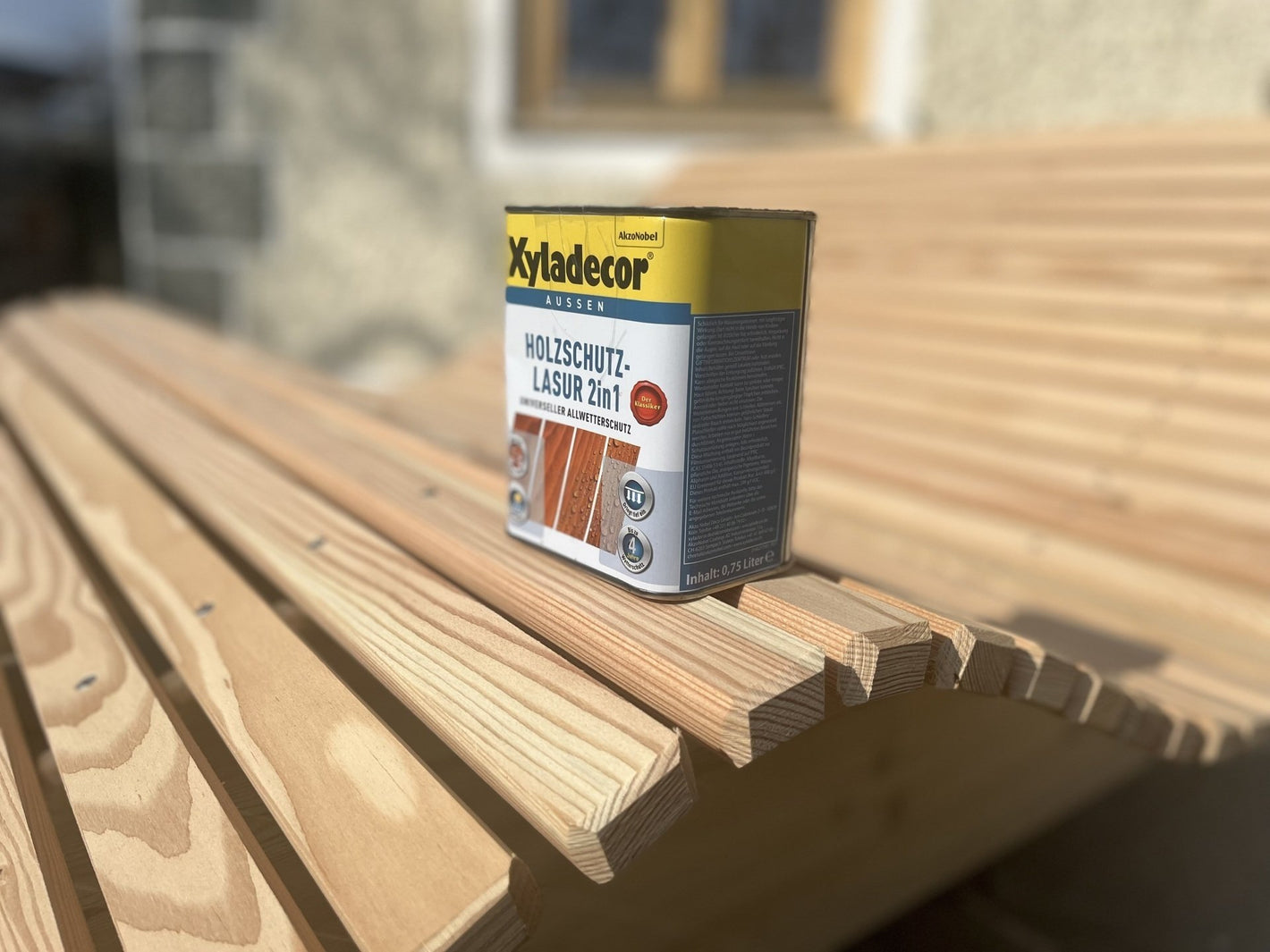 Holzschutzlasur für Himmelsliegen und Holzbrunnen