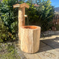 Holzbrunnen ,,Vogelsang" stehender Baumstammbrunnen aus Lärchenholz