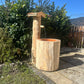 Holzbrunnen ,,Vogelsang" stehender Baumstammbrunnen aus Lärchenholz